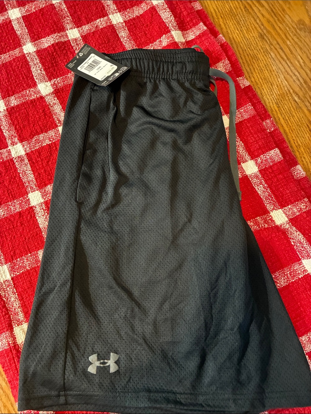 Under Armour Black  Men’s ' Athletic Mesh Shorts with Reflective Logo